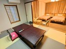 【和洋室一例】6畳の和室スペースとツインのベッドスペースがある和洋室タイプのお部屋です。