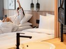 ゲストルーム:25平米禁煙・シモンズ製ベッド シンプルながら温かみのある空間でお寛ぎください。