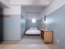 Moderate Large with Japanese-style�b�N�C�[���̃x�b�h�Ə�̏��オ��ɍ���Z�b�g������a�m���ł��B