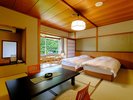 【本館:10畳ツインベッド付き客室:一例】和の情緒と快適なベッドが調和するベッド付き客室