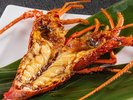 夕食時別注文料理 伊勢海老鬼殻焼き。宿泊日の3日前迄にご注文下さい。*お値段はお電話又はメールにて