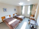 【ツインルーム・全5部屋】シングルベッドが2台並んだお部屋です。
