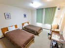 【ツインルーム・全5部屋】シングルベッドが2台並んだお部屋です。