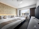 【ツイン(ハリウッドタイプ)】標準的なツインルーム。23uの広さに122cm幅のベッド2台をご用意。