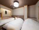 和洋室3名利用時寝室イメージ(ローベット3台)