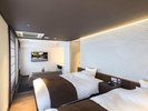 414号室『枯山水』/枯山水の壁と窓側の障子が日本の風情を感じさせる。