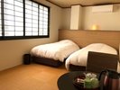 【Eタイプ】洋室 海側のお部屋ではございません。