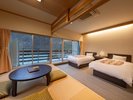 【和洋室】全室南向きで、季節ごとに色鮮やかな山の景色を眺めます。