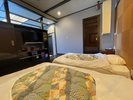 Cタイプ/夕陽と海を眺めるお風呂付の和洋室客室。