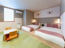 恋愛成就の部屋【禁煙】:ピンクの色調がかわいらしい、館内で一番ゆったりとしたお部屋です