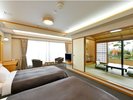 【特別室】ツインベッドと和室6畳(松山城眺望の庭付)