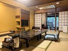 【露天風呂付き客室】「紅梅」。テラス付き露天風呂がついたお部屋。