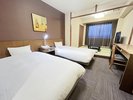 【和洋室Aタイプ】25平米・ベッド2台+4.5畳間のお部屋です