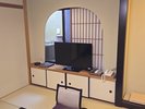 10畳和室温泉露天風呂付(眺望無し)客室内から窓の外に露天風呂が見えます