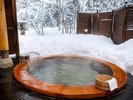 客室露天風呂一例|雪景色とともに楽しむ円形露天風呂