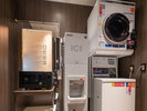 地下1階の共用スペースにレンジ・製氷機・コインランドリーのご用意があります。