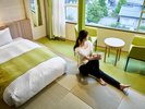 コンセプト和洋室(緑)勾玉をコンセプトに、7つの彩からなるローベッドの和洋室。