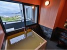 【本館・デラックスツイン】広々とした客室温泉でゆったりおくつろぎいただけます。