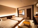 【本館・和モダンツイン】和の温もりを感じる落ち着いた空間のお部屋です。