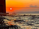 【屋上露天風呂からの夕日】約5月〜6月頃にかけて当館の露天風呂から夕日が望めます
