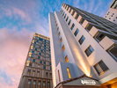龍神ホテル浮島那覇(condo-hotel)夕暮れの外観