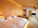 Cタイプのお部屋2名利用時はベッド2台、3名利用時はベッド3台。