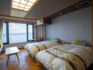 【モダンツインルーム】ツインベッドが付いた、オーシャンビューのゆったりとした客室。