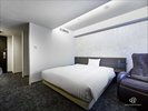 デラックスルームはお部屋の広さ:26u/ベッド幅168cm×203cm マッサージチェアが付いています!