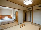 【別館和洋室/25平米】洋室と和室6畳の客室です。山側を向いた大浴場に近い別館の1階です。