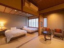 【412】応接セットがあった場所を畳にしてベッドを2つ配置しました。