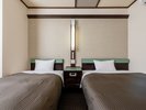 *ツインルーム:17〜18u/ダブルベッドとシングルベッド各1台設置。<客室イメージ>