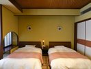 ツインベッドを備え、就寝時も快適に。和の落ち着きに包まれながら、ゆっくりとお休みいただけます