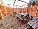 長屋門部屋のプライベートアウトドアスペース。焚き火、薪割りなど完備。冬に薪ストーブ、夏に冷風機。