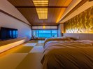 琉球畳にツインベッドを配置した和モダン客室