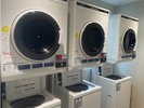 1階にて洗濯機(洗剤自動投入)・乾燥機をご用意しております。