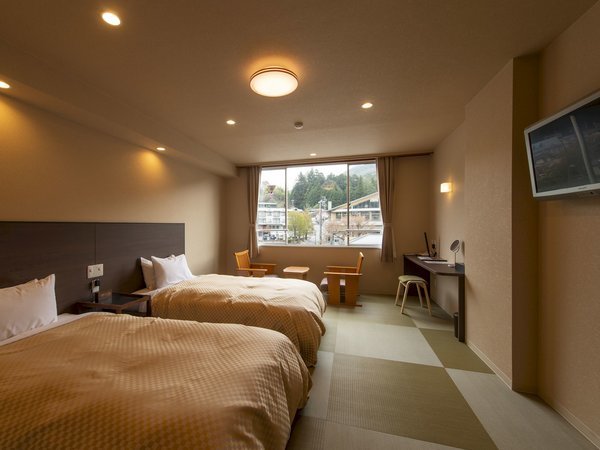 心の館モダン和室は、琉球畳にベッド2台のお部屋です。