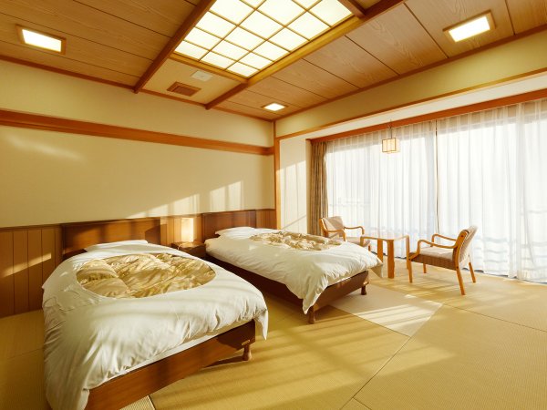 和ツインの一例。ベッド２台を配置した和風のお部屋。