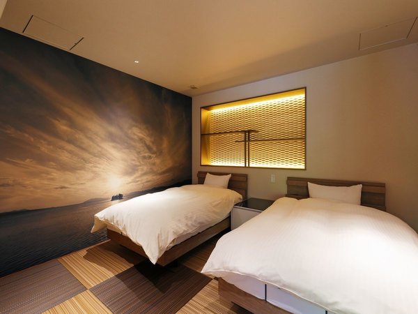 【宍道湖】リクライニングベッドで快適な睡眠環境を。寝室にはお部屋の名前にもなっている宍道湖を壁紙に。