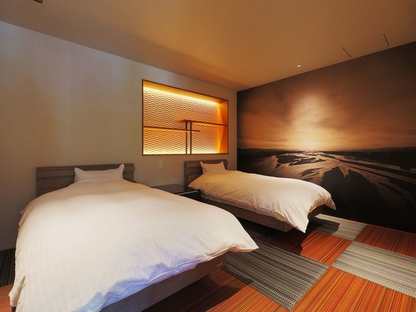 【斐伊川】リクライニングベッドで快適な睡眠環境を。寝室にはお部屋の名前にもなっている斐伊川を壁紙に。