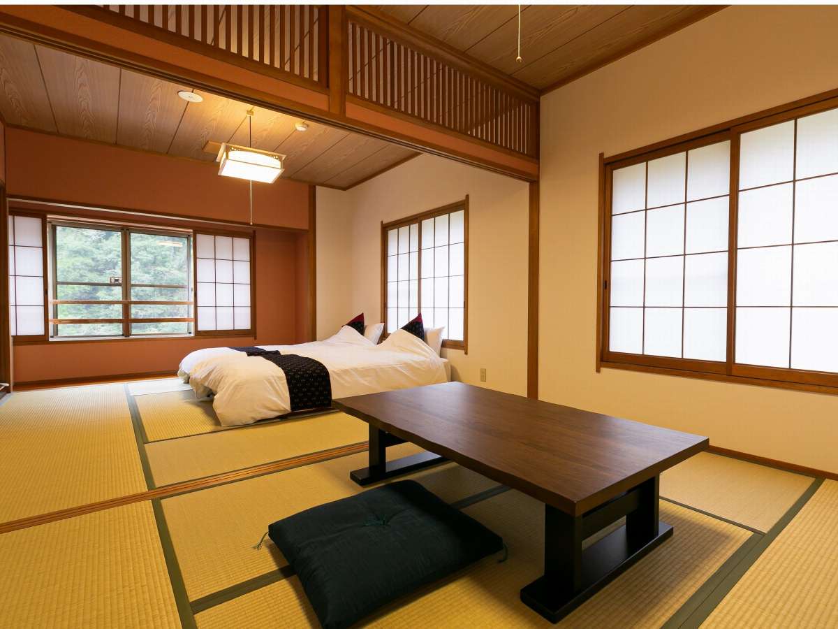 二間つづきの和洋室はベッドをご用意しています