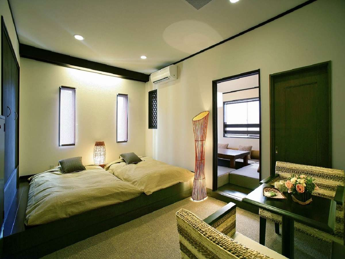【和洋室 一例】ベッドルームと和室の二間続きの客室となっております