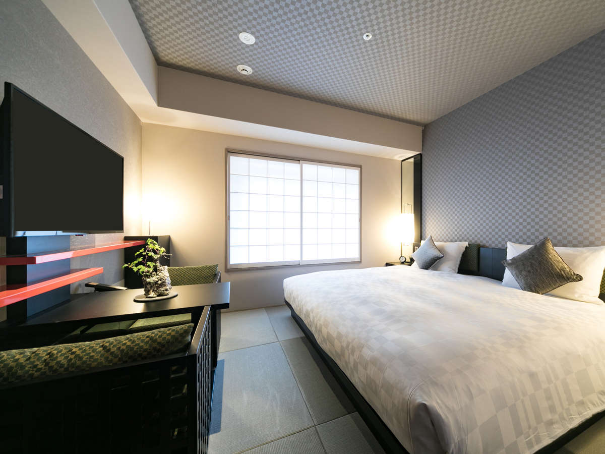 �����C�h�_�u���@���s�̒��S�ŁA�`���Ɛ��������a������~���̃v���C�x�[�g���