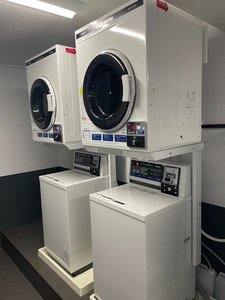 15階にコインランドリー設置!長期滞在をもっと快適に。