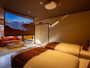 全客室にプロジェクター&スクリーンを完備。様々なコンテンツをお楽しみいただけます。