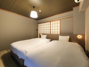 思い思いにくつろげる寝室空間
