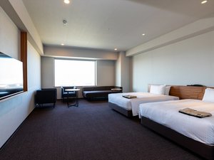 【デラックスツイン】最大4名様でのご利用が可能。広々とした空間にダブルベッドとソファーベッドをご用意