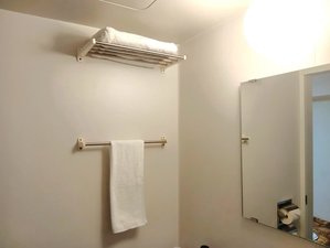 ユニットバス一例です。コンパクトで明るく清潔感のあるバスルームです。