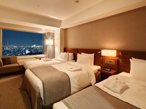 3名利用時シーニックツインルームに、エキストラベッドが一台入ります。