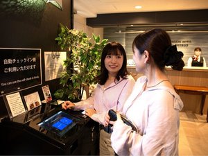 自動チェックイン機