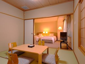 【最上階和洋室(例)】6帖+8帖の2間。お子様連れの家族旅行に◎。最上階からの湖東平野の夕景は格別です。